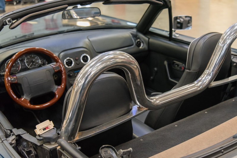 Illustration for article titled I Dunno About This 1997 Miata That's Been 'Converted' Into A 1965 Mustang